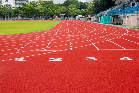 Red running track Synthetic rubber on the athletic stadiumの写真素材