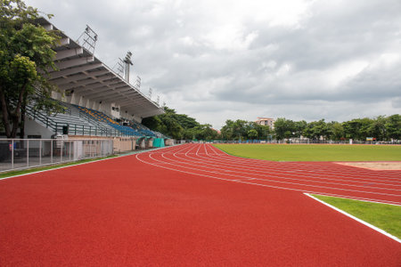 Red running track Synthetic rubber on the athletic stadiumの写真素材