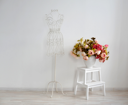 mannequin with flowers backgroundの写真素材