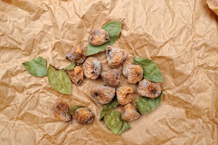 Cake with figs nuts on parchment paper