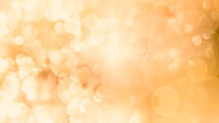 Golden background. Abstract design or wallpaper abstract in gold color with bokeh. Empty. Copy...