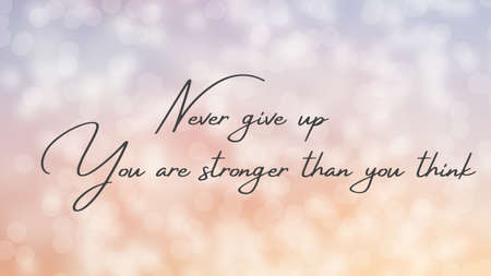 Inspirational quote on a bokeh background with the text Never give up you are stronger than you...