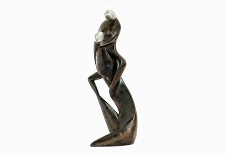 Wooden statuette of couple - love, passion, hugsの写真素材