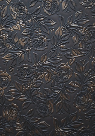 Floral ornament embosed on leather - decorationの写真素材