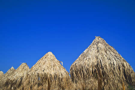 umbrellas in a holiday villageの写真素材