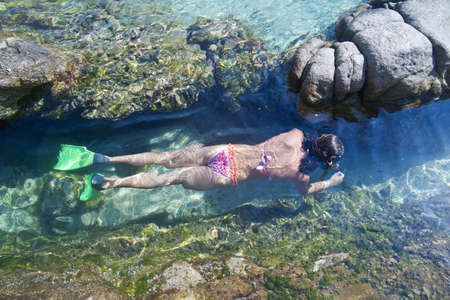 swim with flippers and gogglesのeditorial素材