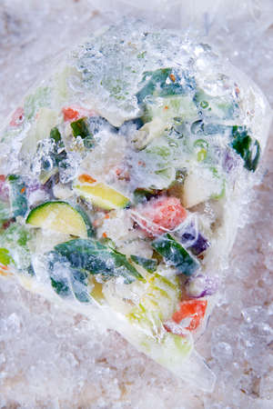 Preparation Of Frozen Mixed Vegetables For Soupの写真素材