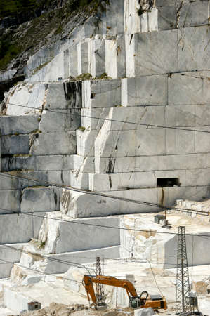 Excavation under the open sky of white marble from Carrara Italy のeditorial素材