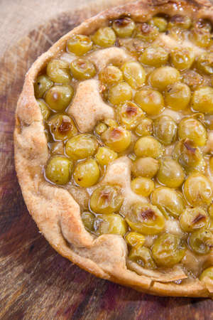 Sweet typical Tuscan focaccia with grapes strawberry white の写真素材