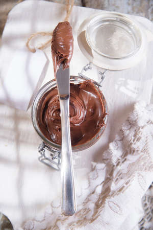 Breakfast with chocolate spread made with hazelnuts and cocoa sugarの写真素材