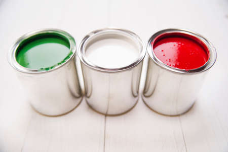 Presentation of the flag of the Italian flag through three cans of paintの写真素材