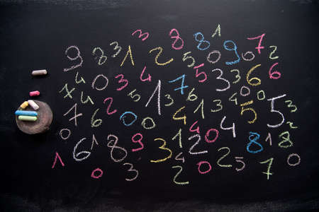 Graphic representation with chalk on blackboard with colorful numbersの写真素材