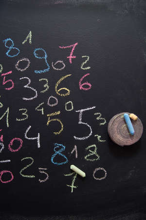 Graphic representation with chalk on blackboard with colorful numbersの写真素材