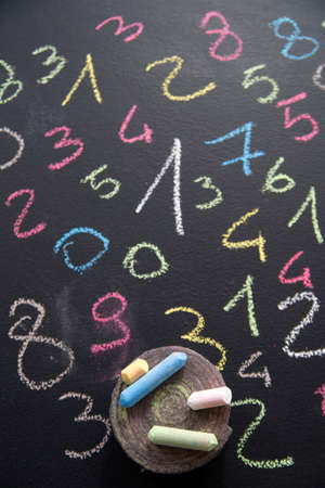 Graphic representation with chalk on blackboard with colorful numbersの写真素材