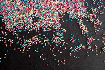 Presentation background made with sugar balls of various colorsの写真素材