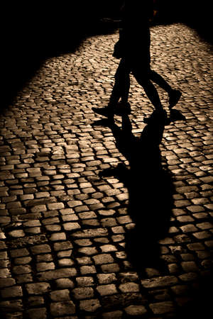 Street photography represents the shadows that arise at sunset timeの写真素材