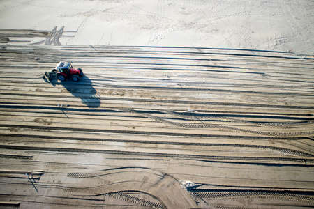Versilia Tuscany, work to restore and level the beach while waiting for the summer seasonの写真素材