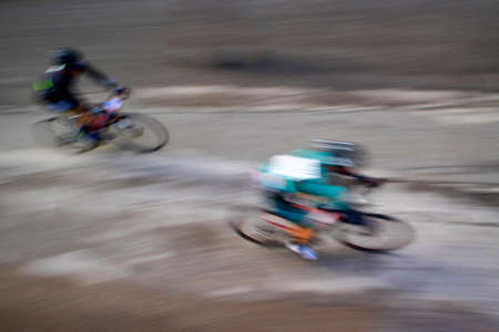 Photo with blur on a competitive road bike raceの写真素材