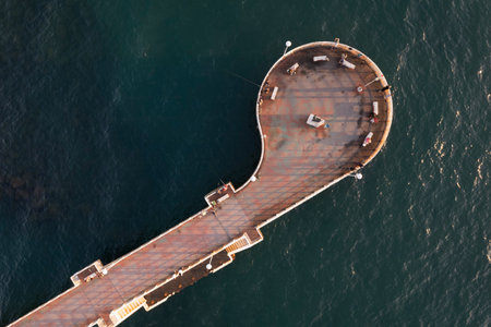 Aerial photographic documentation at sunset of the pier in Marina di Massa Tuscany Italyの写真素材