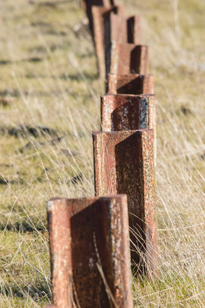 Old standing up rusted railway steel, to foreclosure or depositionの写真素材