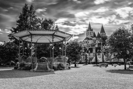 Collegiate Church Saint-Ours Loches of Loches (France). Founded between 963 and 985. View from city park with bandstandの写真素材