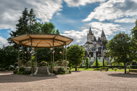 Collegiate Church Saint-Ours Loches of Loches (France). Founded between 963 and 985. View from city park with bandstandの写真素材