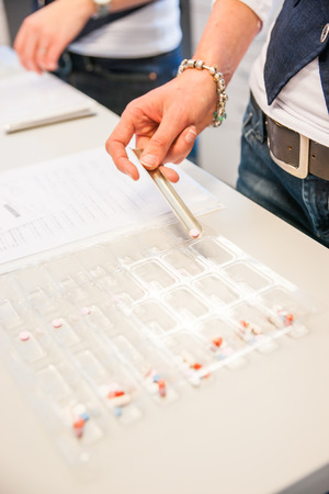 Sorting Medications for patient's at a pharmacy or hospitalの写真素材