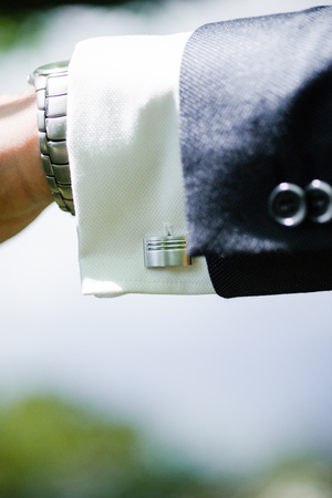 Details of a grooms suit for a wedding