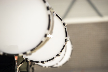 Musicians march, play and make music with large bass drumsの写真素材