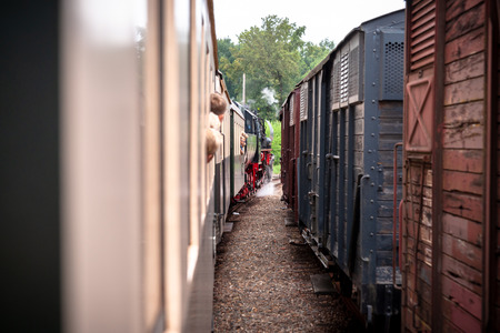 Details and different images of locomotives, marshalling yard, wagons, carriages and train stations in an old industrial heritage museum in the netherlands at Beekbergenの写真素材