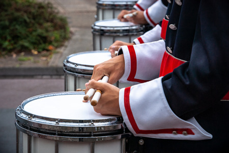 Various details of a performing wind band during a performance or concert with brass and percussion instrumentsの写真素材