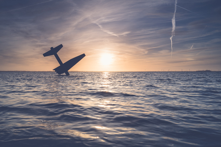 Atmospheric Sunset over a lake with long exposure and smooth water
