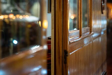 Wood paneling of the wheelhouse on a classic shipの写真素材