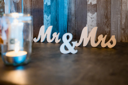 Decorative details of a wedding ceremony with atmospheric attributesの写真素材