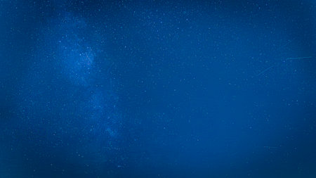 Dark starry night with Milky Way in Zeeland near Westkapelle, Netherlands