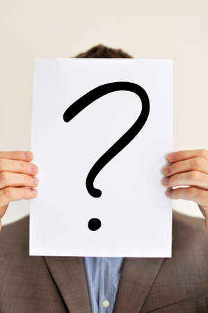 Mann mit Plakat und Fragezeichenの写真素材