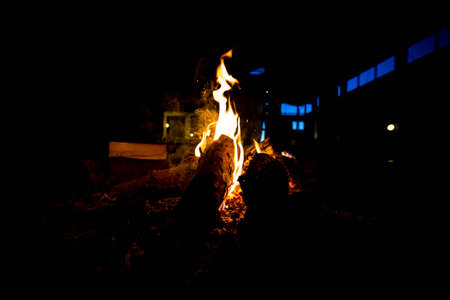 A campfire in the dark