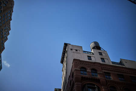a building in new york with blue sky