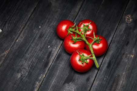 fresh red tomato on tableの写真素材