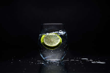 lemon in class of waterの写真素材