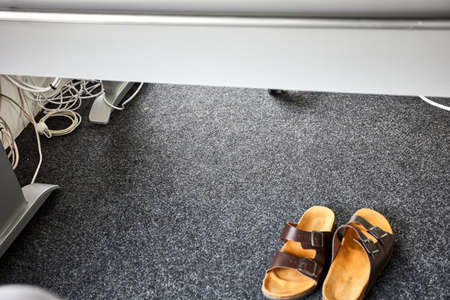 office space with office supplies on the tableの写真素材