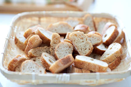 fresh crisp bread on baking sheet on a table