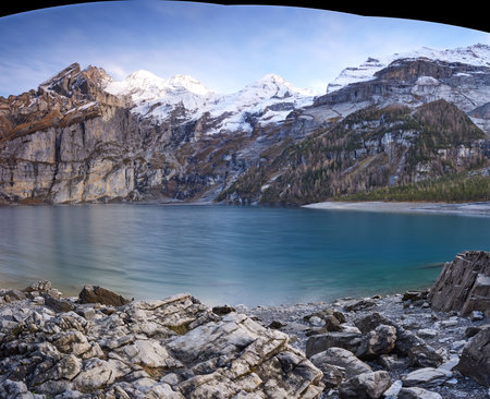 Amazing blue lake with large mountain in Schweizの写真素材