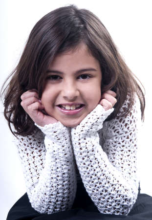 young Brazilian girl with head in hands の写真素材