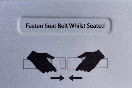 safety pictogram for seat belts in a planeの写真素材