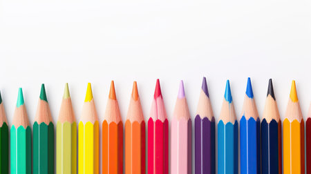 colored pencil set loosely arranged on white background. colored pencils are not arranged exactly in a row.の素材