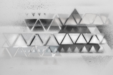 spray painting black and white triangleの写真素材