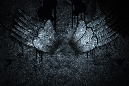 wing on the dark wall illustrationの写真素材