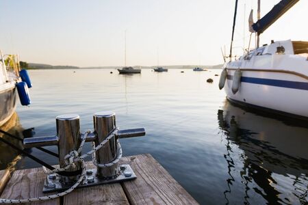 Moored yachts on the lakeの写真素材