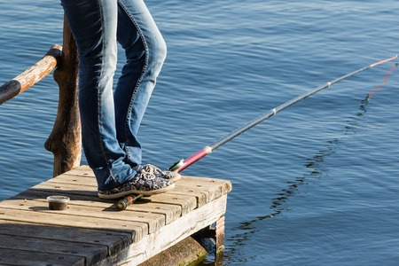 Girl with fishing rod